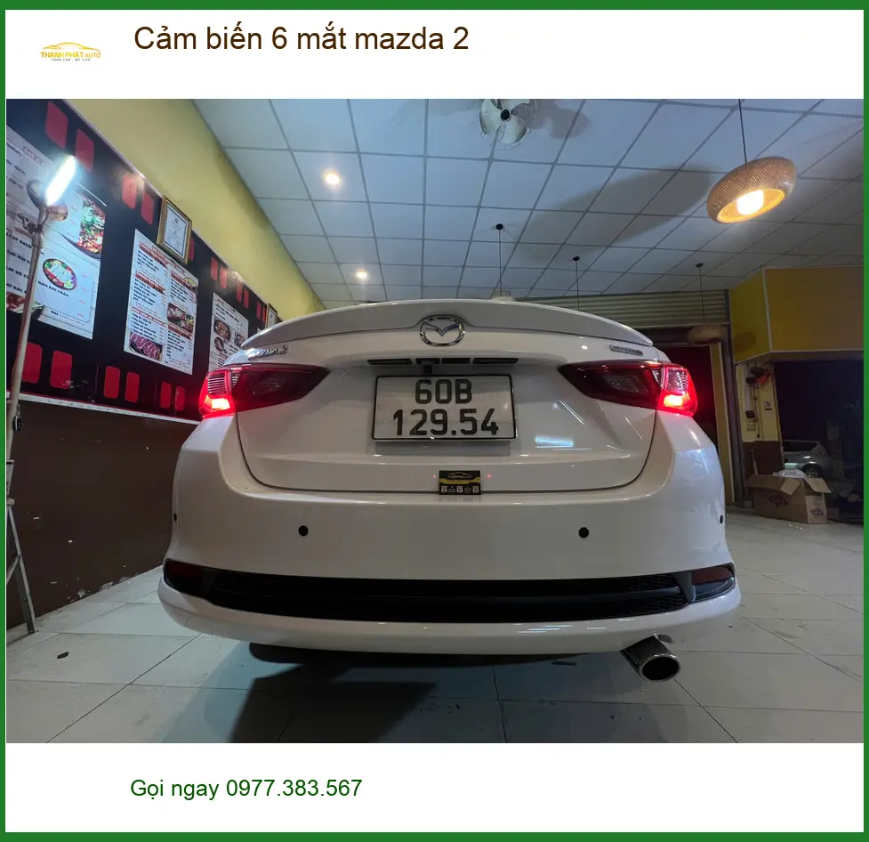 Chị Mai lắp cảm biến 6 mắt Mazda 2 Quận 10 để an tâm khi đậu xe ở chung cư ảnh thực tế 2