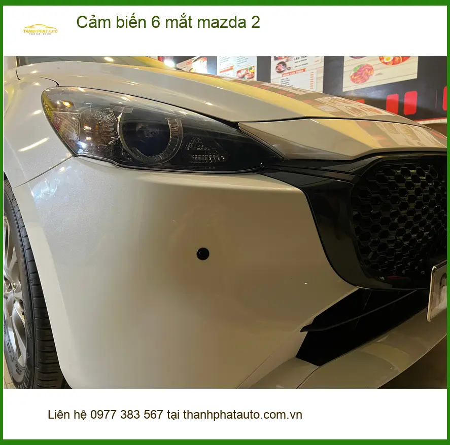 Chị Mai lắp cảm biến 6 mắt Mazda 2 Quận 10 để an tâm khi đậu xe ở chung cư ảnh thực tế 4