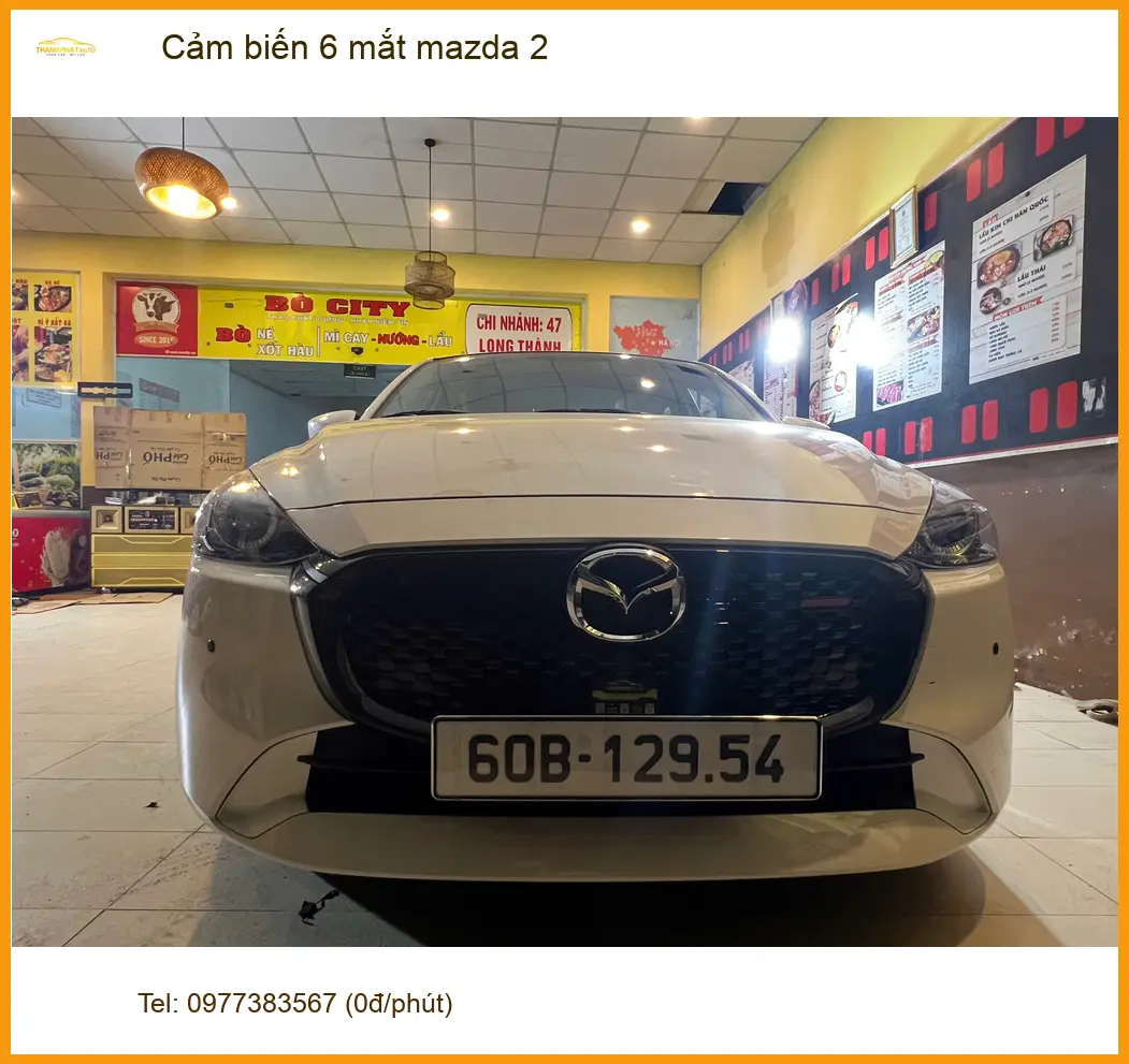 Anh Minh lắp cảm biến 6 mắt Mazda 2 tại Quận 1 để đậu xe an toàn hơn