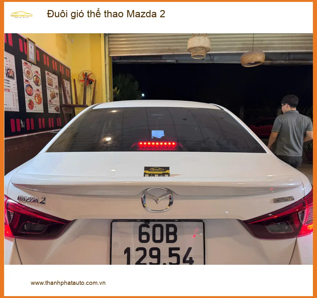 Chị Minh Thư độ đuôi gió thể thao Mazda 2 tại Quận 12 để xe trông cá tính hơn ảnh thực tế 2