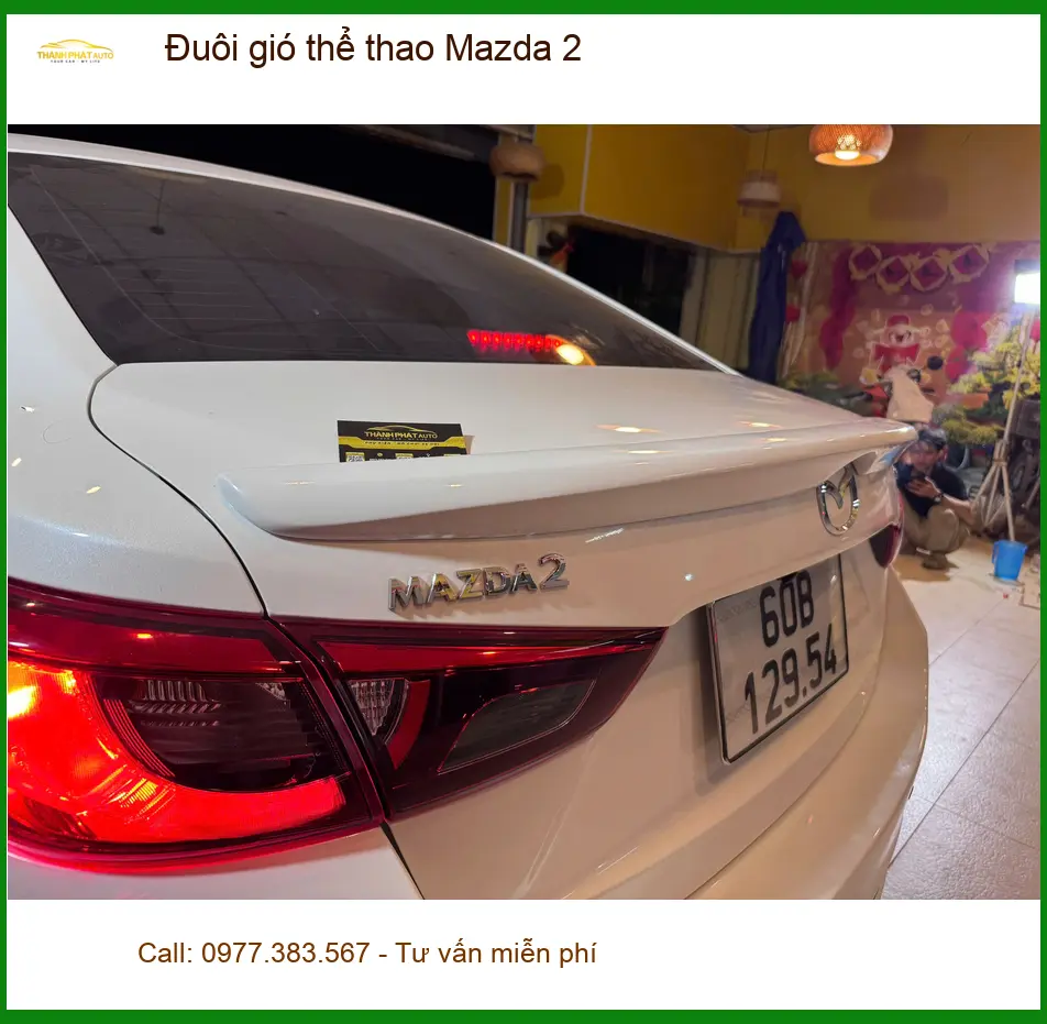 Chị Minh Thư độ đuôi gió thể thao Mazda 2 tại Quận 12 để xe trông cá tính hơn ảnh thực tế 3