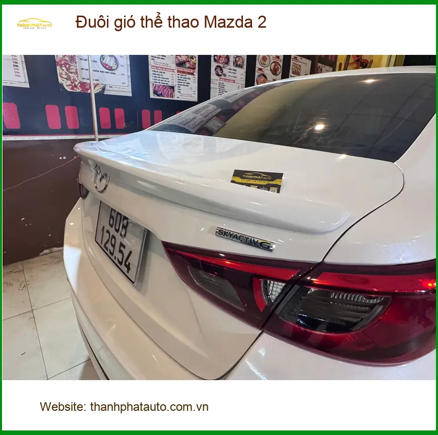 Chị Minh Thư độ đuôi gió thể thao Mazda 2 tại Quận 12 để xe trông cá tính hơn ảnh thực tế 4