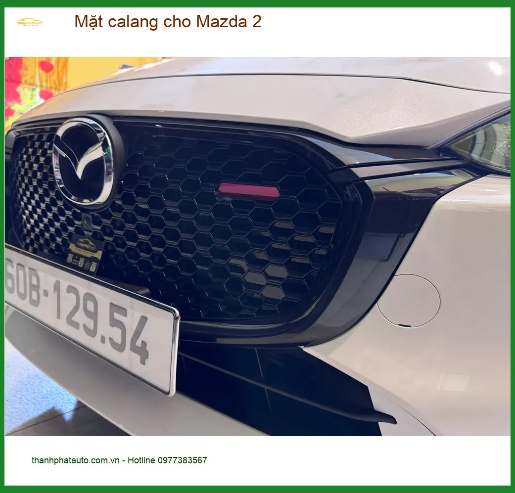 Chị Thanh Thúy độ mặt calang cho Mazda 2 tại Quận 7 vì muốn xe trông nổi bật hơn ảnh thực tế 3