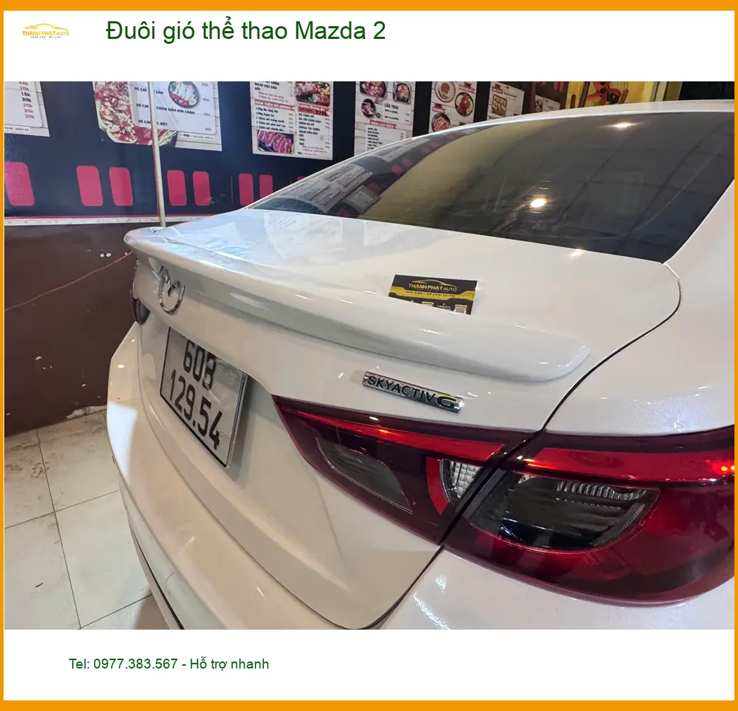 Anh Tùng lắp đuôi gió thể thao Mazda 2 tại Phú Nhuận tăng vẻ cá tính ảnh thực tế 2