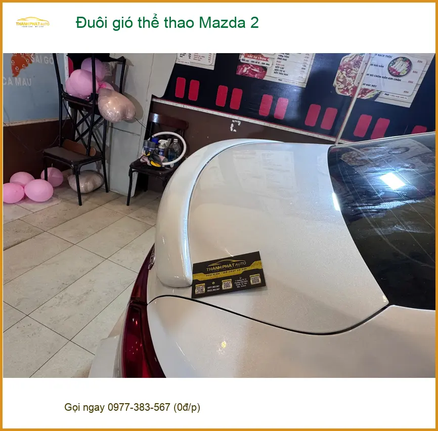Anh Tùng lắp đuôi gió thể thao Mazda 2 tại Phú Nhuận tăng vẻ cá tính ảnh thực tế 3