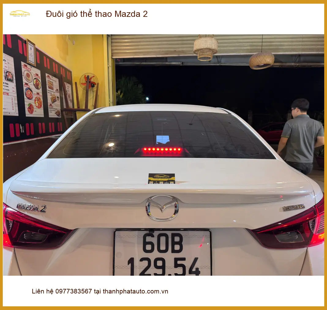 Anh Tùng lắp đuôi gió thể thao Mazda 2 tại Phú Nhuận tăng vẻ cá tính ảnh thực tế 4