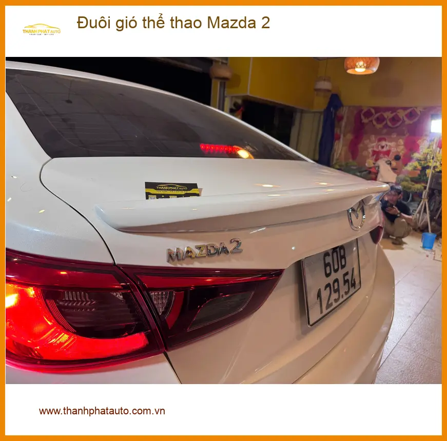 Anh Minh lắp đuôi gió thể thao Mazda 2 tại Quận Gò Vấp để tăng vẻ đẹp xe ảnh thực tế 3
