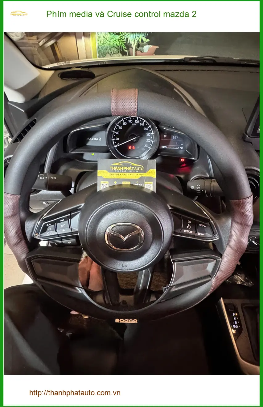 Chị Vân lắp Phím media và Cruise control Mazda 2 tại Quận 7 lái xe đường dài thoải mái hơn ảnh thực tế 5
