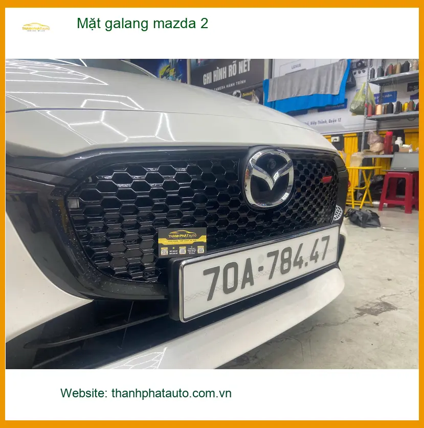 Anh Dũng thay Mặt galang Mazda 2 tại Quận Tân Phú để xe trông mới mẻ hơn ảnh thực tế 2